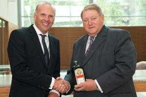 Michael Volke of  Mast-Jägermeister (left) and Martin Watts, joint MD of Cellar Trends shake hands on the deal