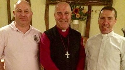 Bar staff: Darren Lingley, bishop Steve Cottrell and vicar Peter Allan