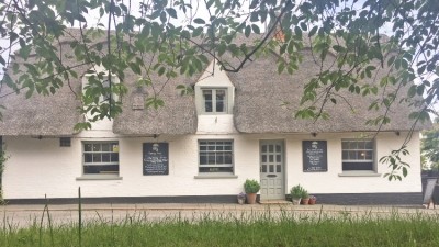 Close-knit village: The Hail Weston Community Pub Society refused to allow the last pub disappear and now owns it