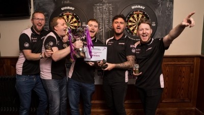 Hitting the mark: a team from the Brocket Arms won the sixth instalment of JDW's annual charity darts tournament