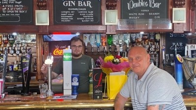 Charity champs: publican Carl Grundy (right) and Jake at the Vulcan Inn