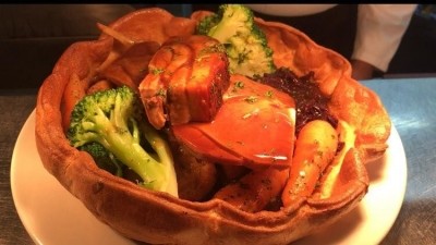 Big portion: dish includes a trio of meats and vegetables in a Yorkshire pudding (image: Sussex Arms, Facebook)