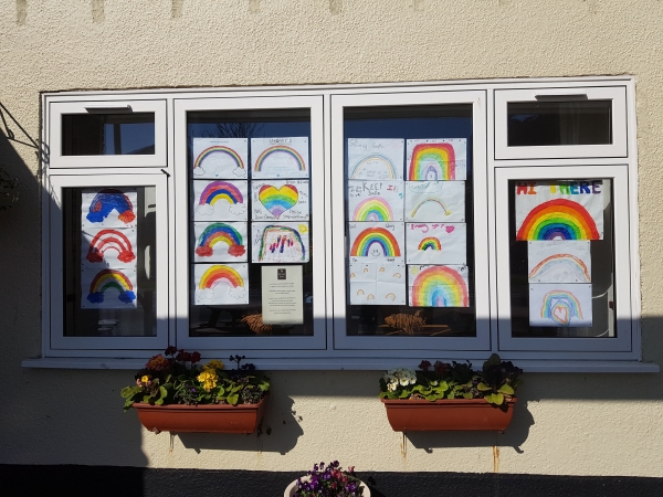 The Ram Inn has raised money that will help its local hospital trust with rainbow posters in the windows