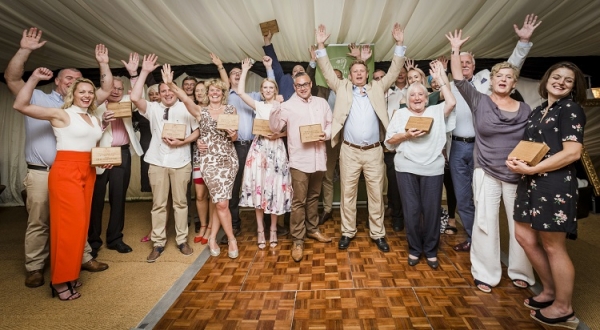 The winners celebrate at this year's award ceremony