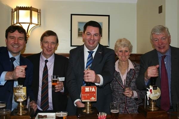 Duty: pubs minister Andrew Percy (centre) with fellow MPs and BBPA representatives