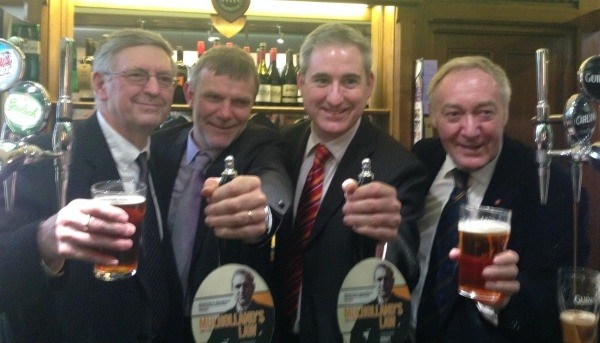 Greg Mulholland MP and brewer Paul Briscoe will the celebratory beer