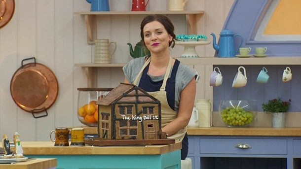 Great British Bake Off winner Candice Brown with her gingerbread version of the King William IV pub