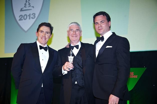 John Longden with awards host Rob Brydon (left) and the PMA's executive director Tim Brooke-Webb
