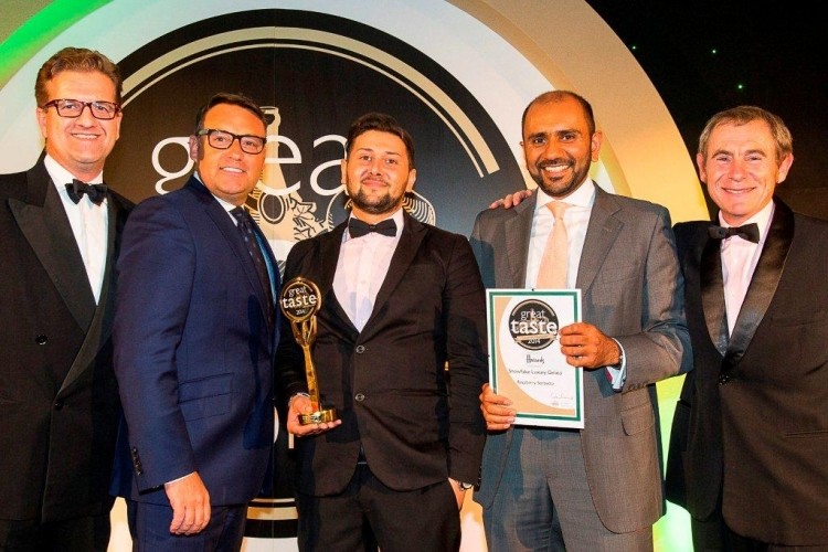 Great Taste 2014 Supreme Champion: (left to right) Guild of Fine Food MD John Farrand; Harrods director of foods Bruce Langlands; Snowflake gelataio Paolo Rivieccio; Snowflake owner Asad Khan; presenter Nigel Barden