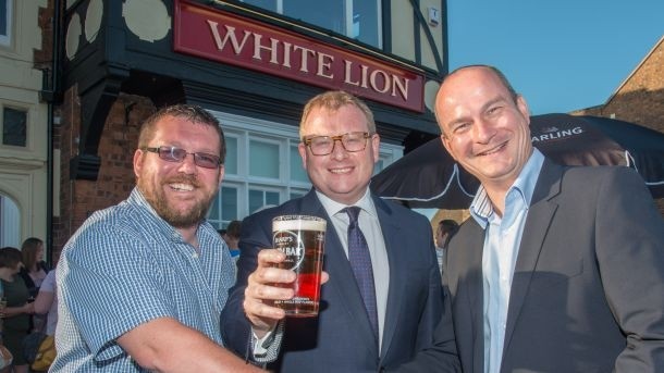 Licensee Paul Cavan, MP Marcus Jones, and Punch Taverns new business development manager Stuart Burley