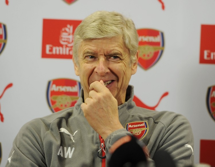 Smiling: Arsène Wenger has every right to be pleased with his side's performance