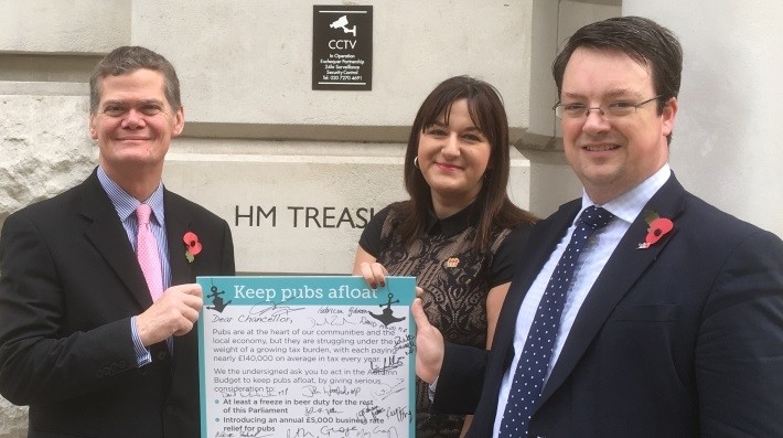 You’ve got mail: L-R Stephen Lloyd, MP for Eastbourne, Ruth Smeeth, MP for Stoke-on-Trent North, and MP Mike Wood deliver the MPs’ message to the Treasury 