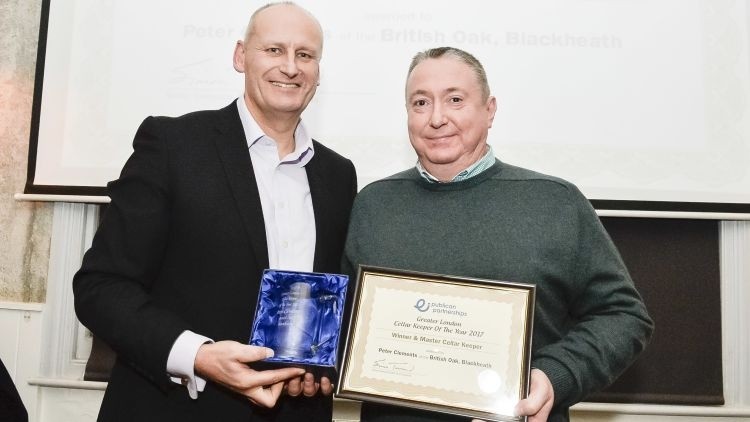 Top cellar fella: publican Peter Clements (right) receives the award from Kim Francis