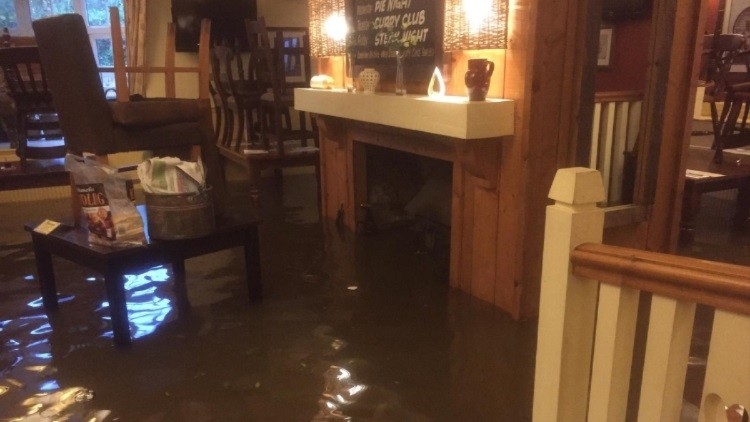 Pouring rain: pubs across the UK have been impacted by thunderstorms (image: Huw Jones, The Sportsmans Rest)