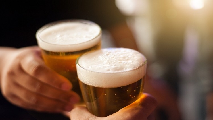 Drinks poured: some 3m pints of beer are expected to be served on the first day pubs can reopen inside (image: Getty/Wasan Tita)
