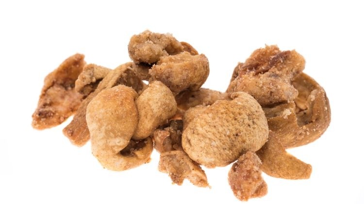 Brands recalled: the pork scratchings (stock image) have been linked to more than 170 salmonella cases (image: Getty/clubfoto)