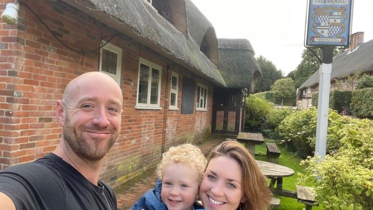 Perfect timing: Licensees Joel Czopor and Susie Clarke with their son outside new pub the Tichborne Arms