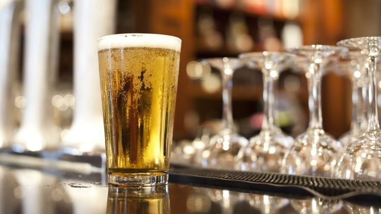 Rising cost: the average price of a pint of lager has increased by 78p in the past 10 years (image: Getty/Juanmonino)