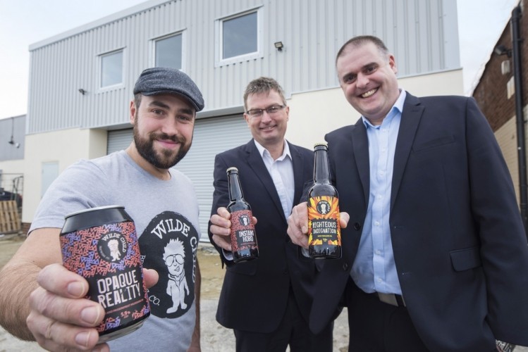 Brewing success: Wilde Child Brewing founder Keir McAllister-Wilde with Andy Clough of the BEF and Matthew Grant from Garbutt + Elliott