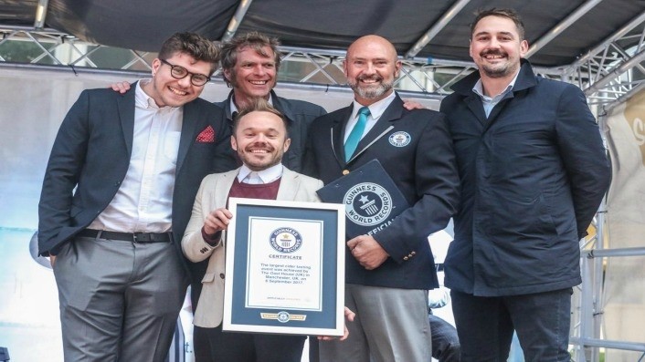 the winners: Back row - Kieran Hartley, two Guinness World Record officials, Adam Wilde, general manager of The Oast House, Front row Matthew Lewty, events manager for The Oast House 
