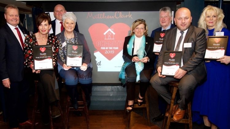 Rose in bloom: finalists gathered at the Tattershall Castle pub where the Rose of Mossley was crowned winner