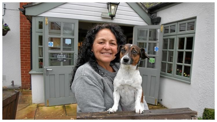 Puppy love: Jayne Tilsey of the Fox & Hounds, which was named Dog-friendly Pub Awards overall winner
