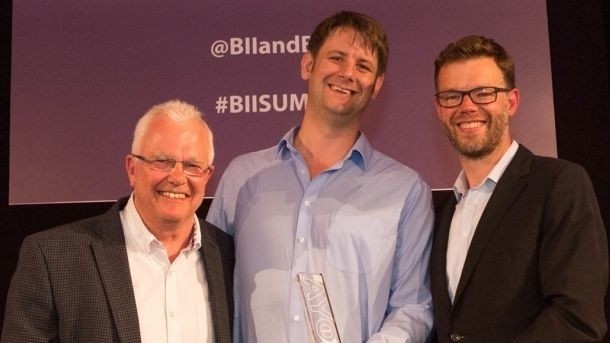 Looking back: Last year's winner Mark Higgs (centre) with the BII's Mike Clist (l) and Sky Business MD David Rey