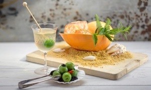 Dressed crab with samphire, Sicilian olives, caviar and edible sand paired with a dirty martini cocktail 