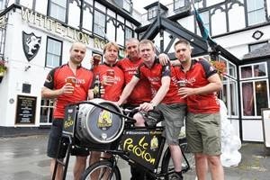 VIDEO: SA Brain's team cycle 150 miles across Wales with cask of Tour de France ale