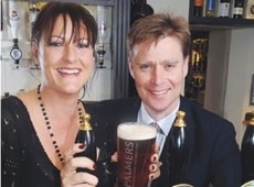 Nikki Bligh and Palmers's Tom Hutchings raise a glass