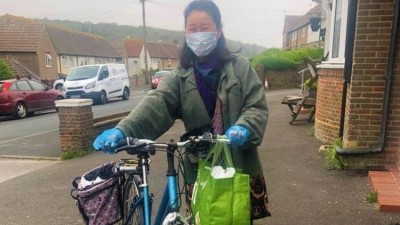 Amazing volunteers: Ayami preparing to deliver meals 