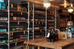 The store on Gray's Inn Road will stock more than 250 bottle beers and four beers on tap