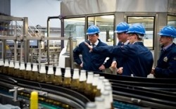 David Cameron and Andrew Griffiths at the Molson Coors plant