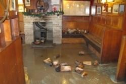The Harbour Inn's top bar after the floods