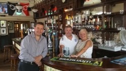 Punch’s senior partnership development manager, Stuart Plant with Horse and Jockey licensees Paddy and Carol Fleet.