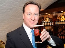 Change of heart: Prime Minister David Cameron backs smoke-free pubs