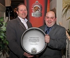 Richard Everard (right) collects the award from CAMRA East Midlands regional director Carl Brett