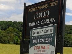 David Andrews said the positioning of for-sale signs around his pub put customers off
