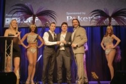 Redtooth MD Martin Green (front centre) receiving Best Poker League at the British Poker Awards