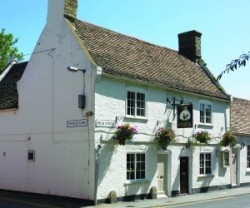 Accolade: The Cock in Hemingford Grey has been named the Good Pub Guide's Pub of the Year 2013