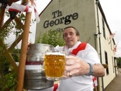 Russell Proctor with the firkin he has promised to a customer in an unusual wager. Picture by Paul Howard