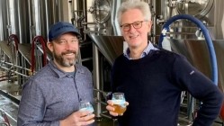 Deal done: Mondo founder and MD Todd Matteson and Hogs Back Brewery owner Rupert Thompson