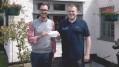 Braksear licensee Richard Edwards presents cheque to Benjamin Bar-Lev of Sue Ryder