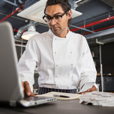 https://www.morningadvertiser.co.uk/var/wrbm_gb_hospitality/storage/images/media/images/head-chef-on-laptop-controlling-costs/6011551-1-eng-GB/Head-Chef-On-Laptop-Controlling-Costs.jpg